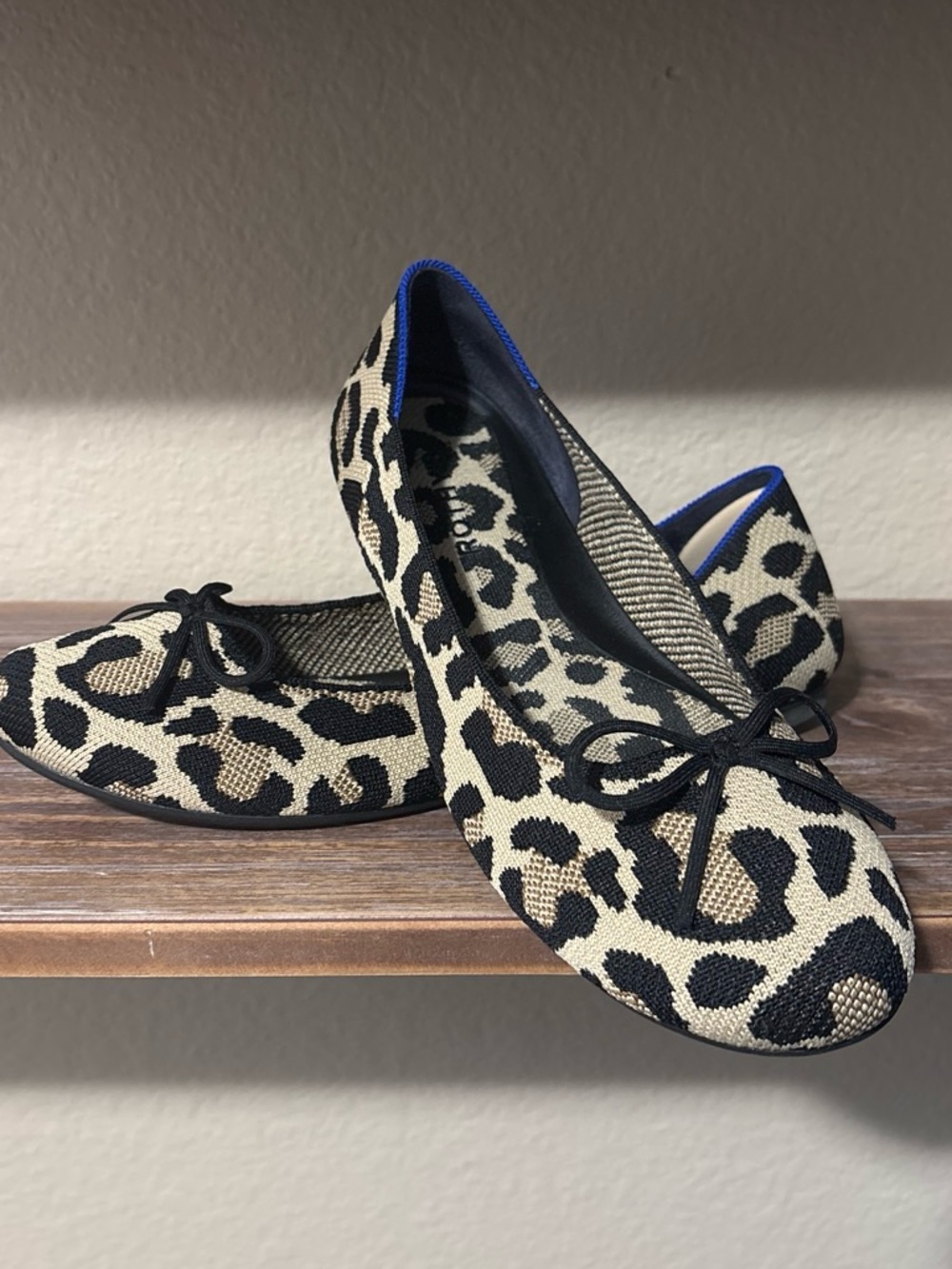 Rothy's Leopard Print Ballet Flats - Black and Beige with Blue Trim. Size 10.5